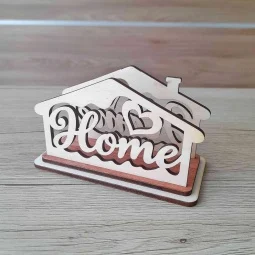 Moderný drevený stojan na papierové servítky v tvare domčeka s vyrezaným textom Home